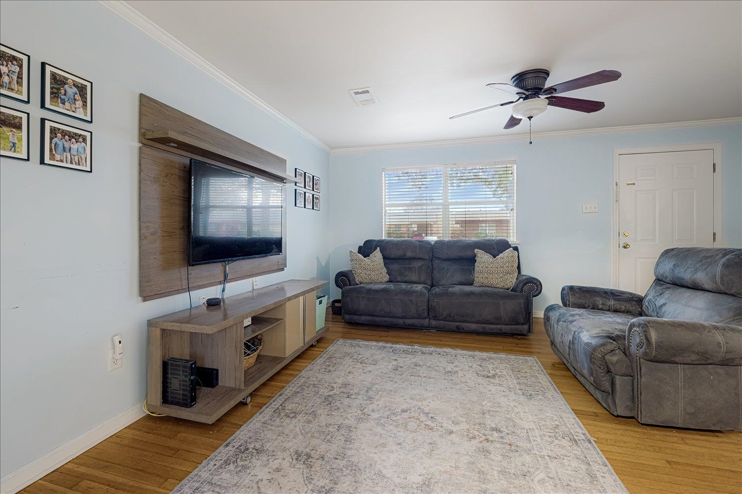 524 Mineral Road Memphis, TN 38120 - Photo 15 of 26 a living room with furniture and a flat screen tv