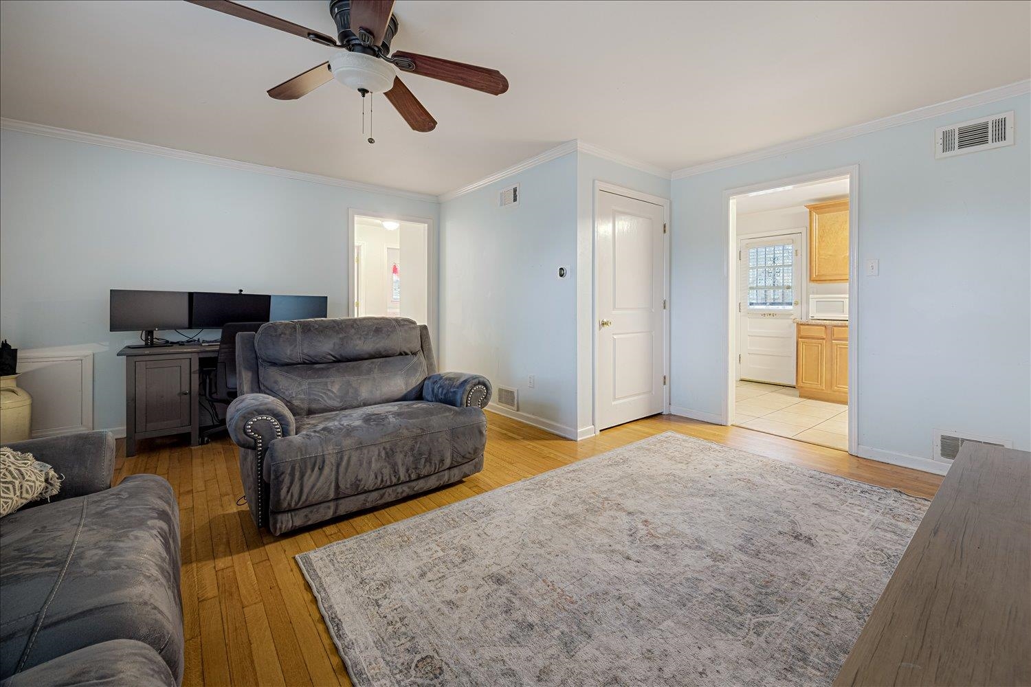 524 Mineral Road Memphis, TN 38120 - Photo 16 of 26 a living room with furniture and a flat screen tv