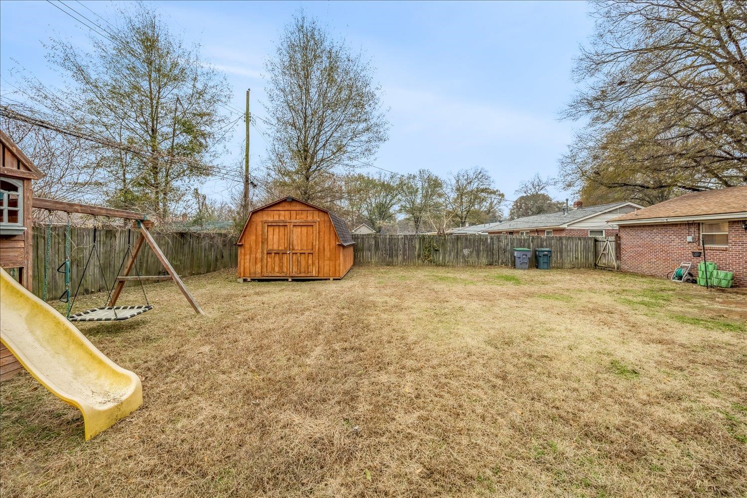 524 Mineral Road Memphis, TN 38120 - Photo 18 of 26 a view of a house with backyard
