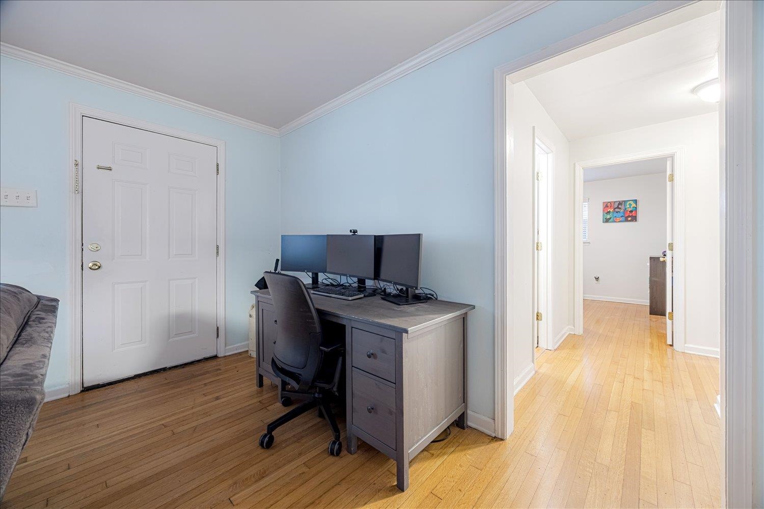 524 Mineral Road Memphis, TN 38120 - Photo 5 of 26 a view of a workspace with furniture and wooden floor