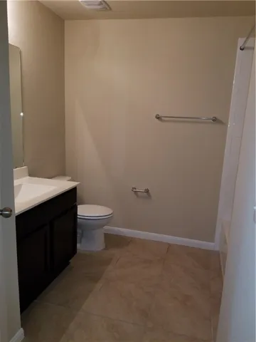 a bathroom with a toilet