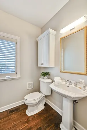 a bedroom with two beds and a couch