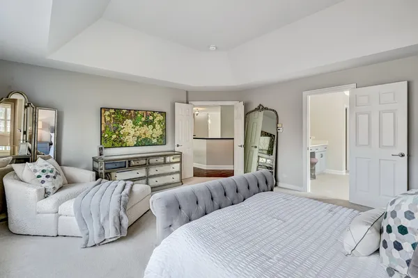 a view of a hallway with stairs