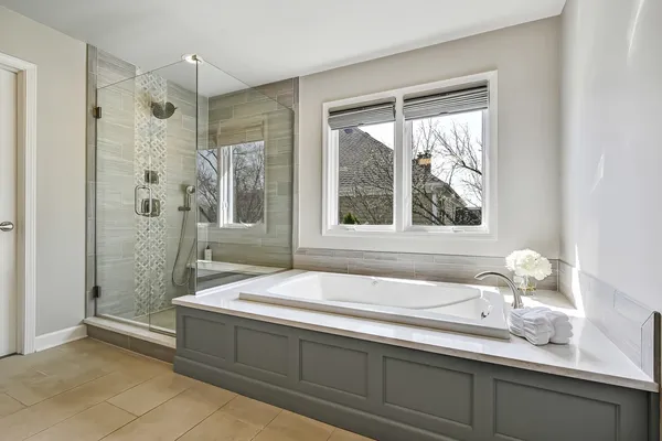 a bathroom with a toilet sink and a mirror