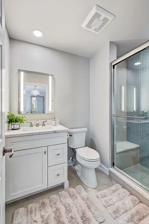 a kitchen with a table and chairs in it