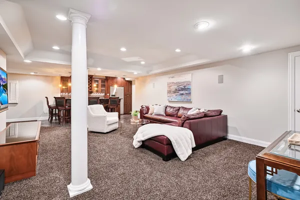 a view of room with workspace and windows