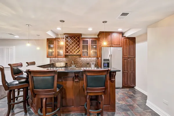 a aerial view of a house with garden