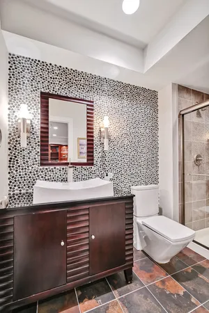 a view of a house with backyard swimming pool and sitting area