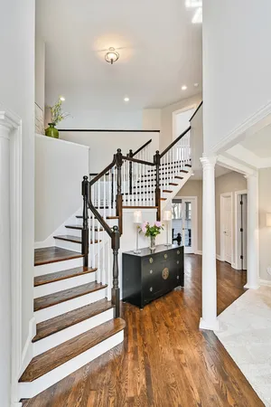 a view of a dining room with furniture and window