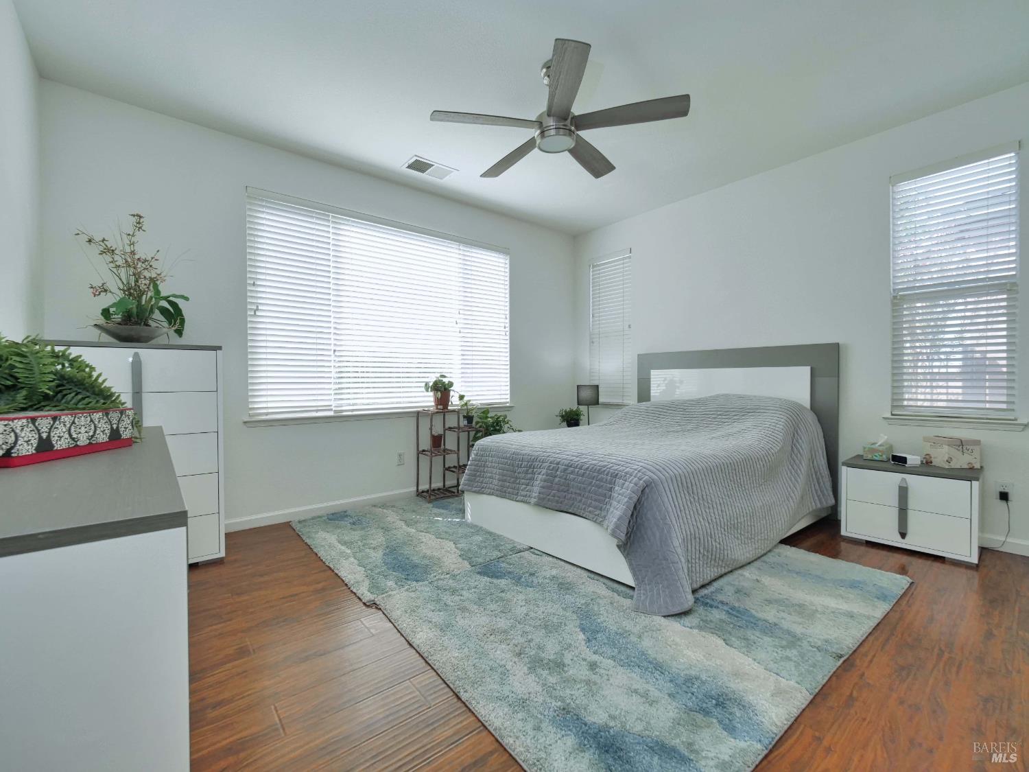 659 Pinehurst Drive, Unit CA Rio Vista, CA 94571 - Photo 14 of 40 a bedroom with a large bed and a window