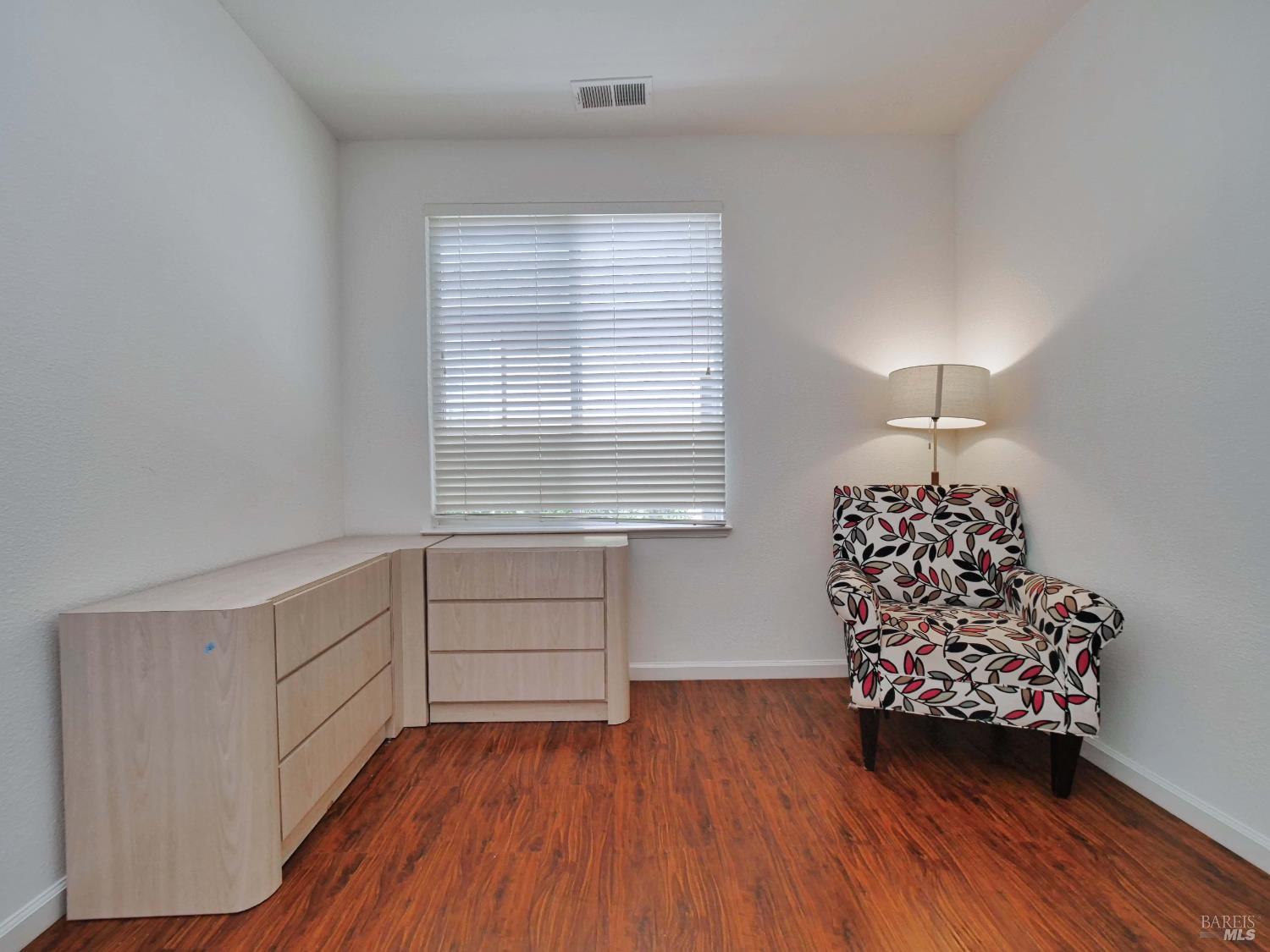 659 Pinehurst Drive, Unit CA Rio Vista, CA 94571 - Photo 18 of 40 a room with window and a wooden floor