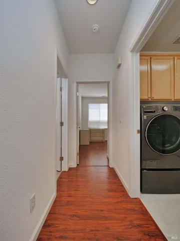a view of a bedroom from a hallway