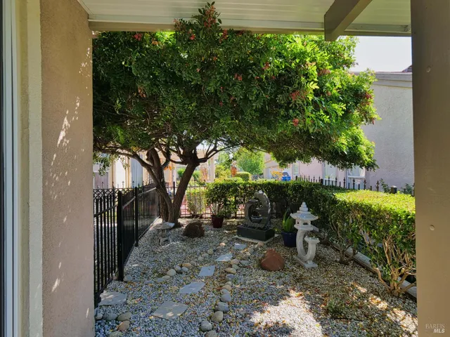 a view of a backyard with garden