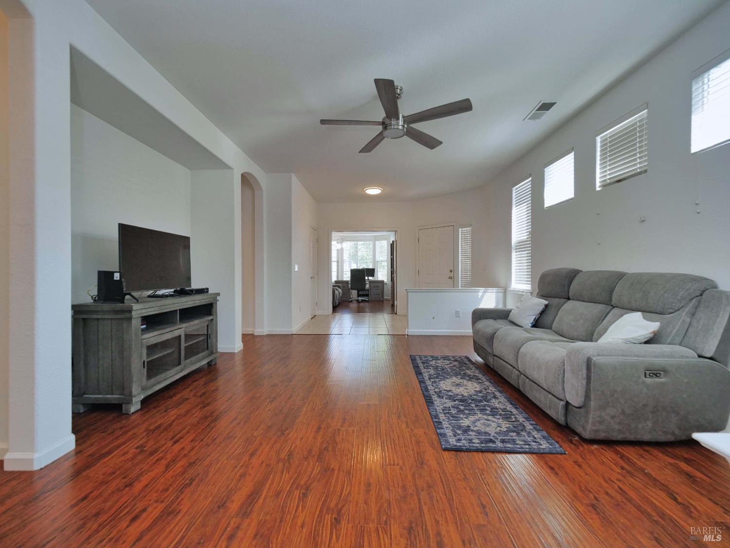 659 Pinehurst Drive, Unit CA Rio Vista, CA 94571 - Photo 4 of 40 a living room with furniture and a wooden floor