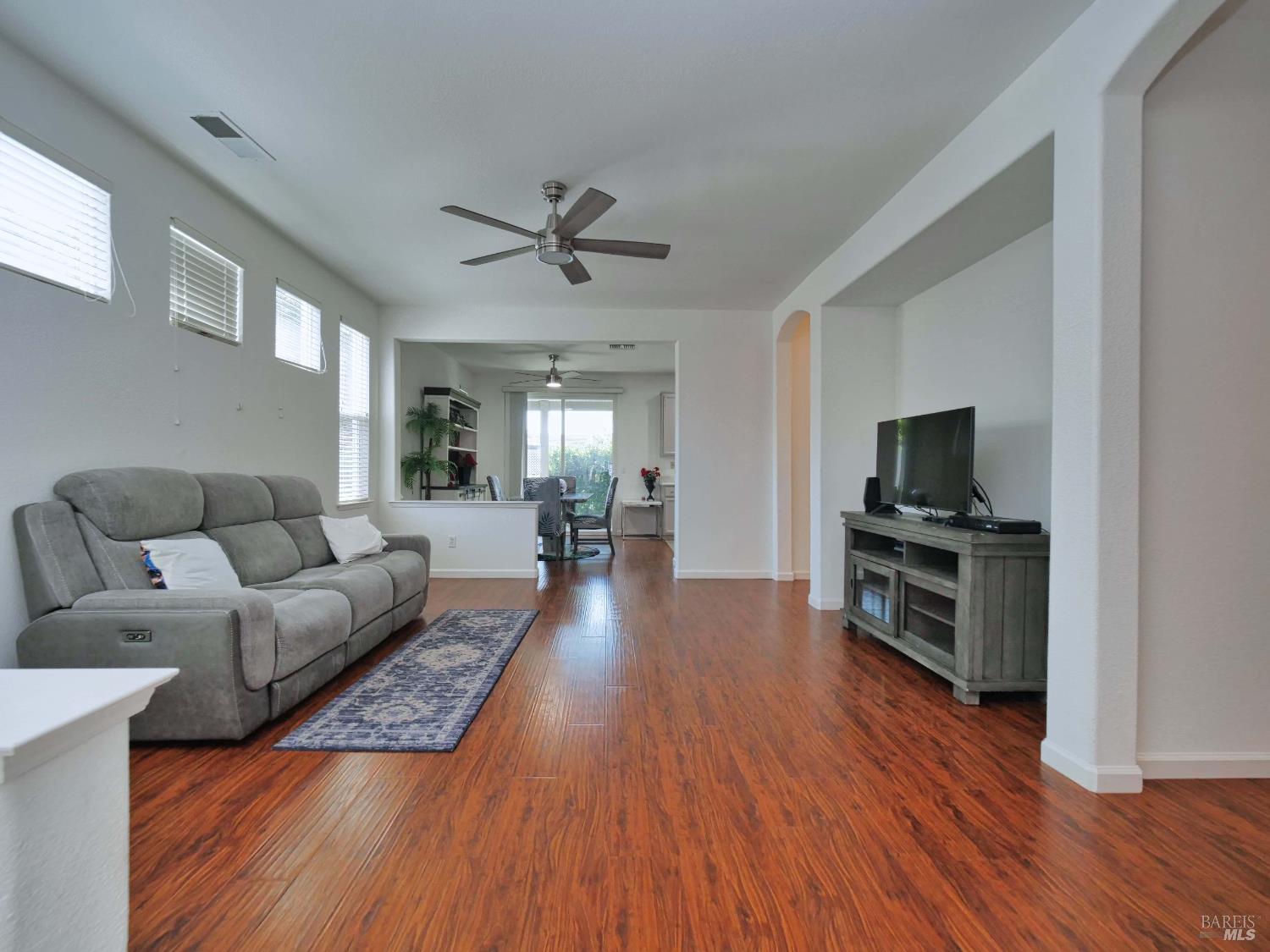 659 Pinehurst Drive, Unit CA Rio Vista, CA 94571 - Photo 6 of 40 a living room with furniture and a flat screen tv