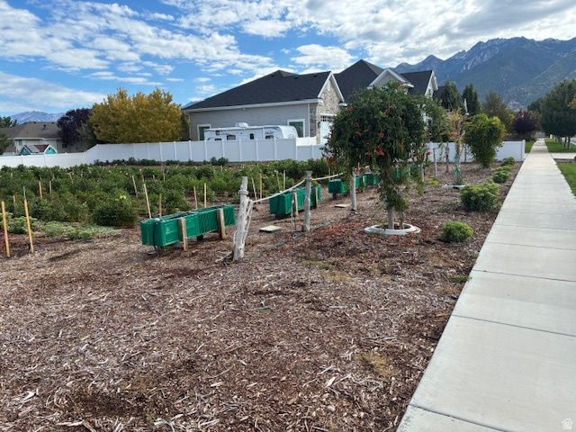 367 Pheasant View Drive, Unit 2 Draper, UT 84020 - Photo 5 of 13 Manicured landscaping with established plants and a concrete sidewalk
