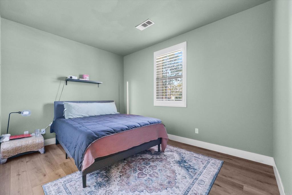 45418 Seagull Way Temecula, CA 92592 - Photo 13 of 31 a bedroom with a bed and a window