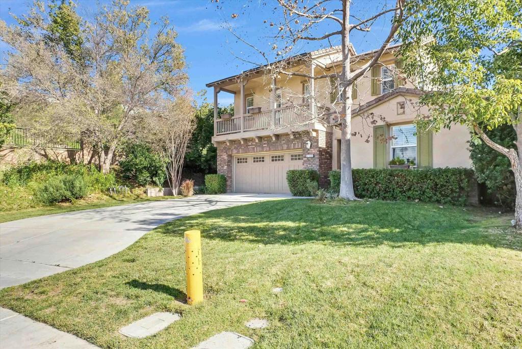 45418 Seagull Way Temecula, CA 92592 - Photo 2 of 31 a view of a big yard next to a house