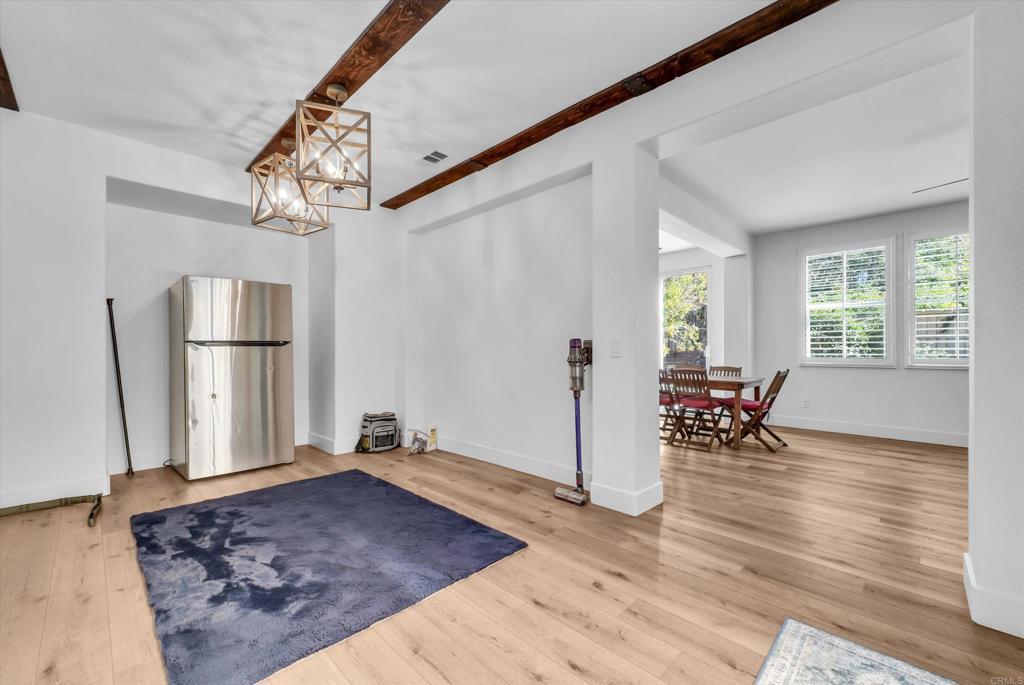 45418 Seagull Way Temecula, CA 92592 - Photo 5 of 31 a view of empty room with wooden floor