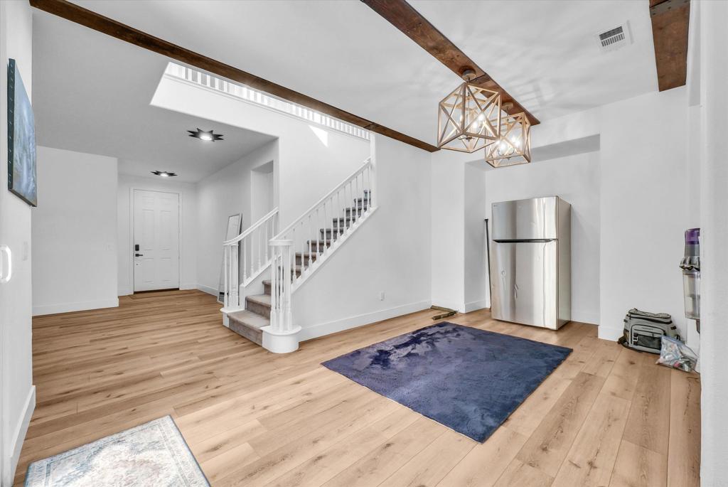 45418 Seagull Way Temecula, CA 92592 - Photo 6 of 31 a view of entryway and hall with wooden floor