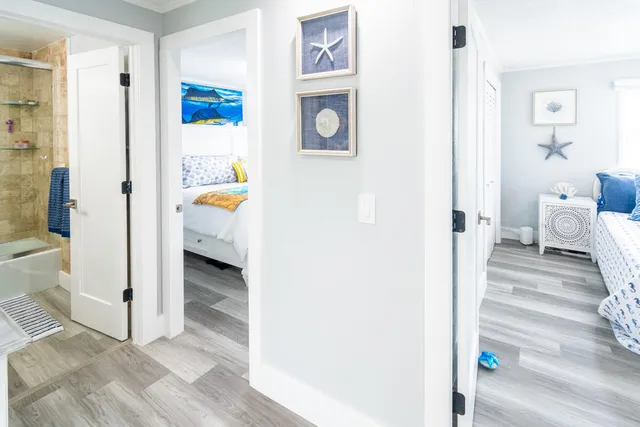 a view of a bedroom from a hallway