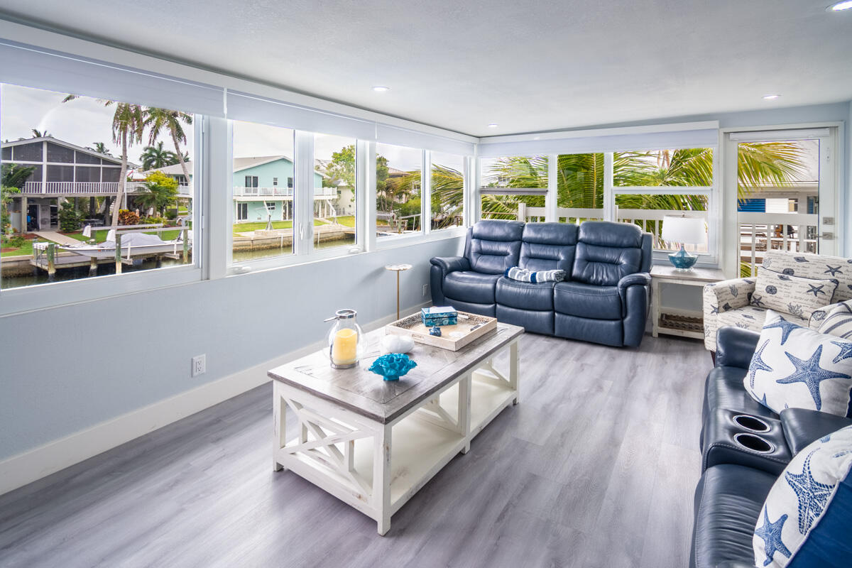 576 Coconut Avenue Goodland, FL 34140 - Photo 2 of 38 a living room with furniture and a large window