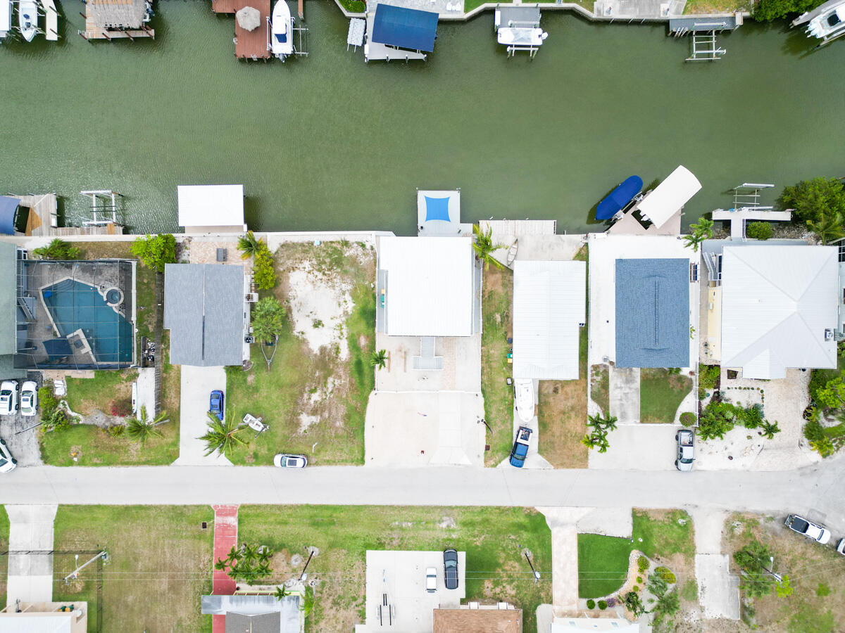576 Coconut Avenue Goodland, FL 34140 - Photo 35 of 38 an aerial view of a house with a swimming pool
