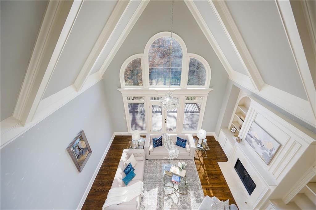 2760 Sugarloaf Club Drive Duluth, GA 30097 - Photo 47 of 67 a view of living room with furniture and a fireplace