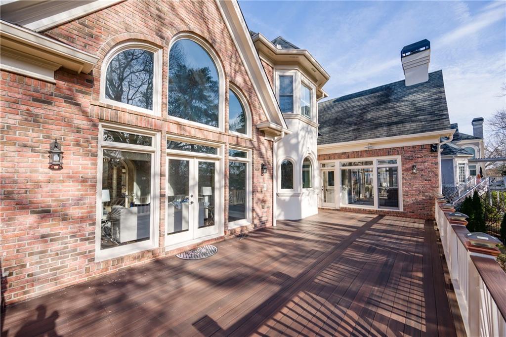 2760 Sugarloaf Club Drive Duluth, GA 30097 - Photo 49 of 67 a view of a house with a door and a outdoor space