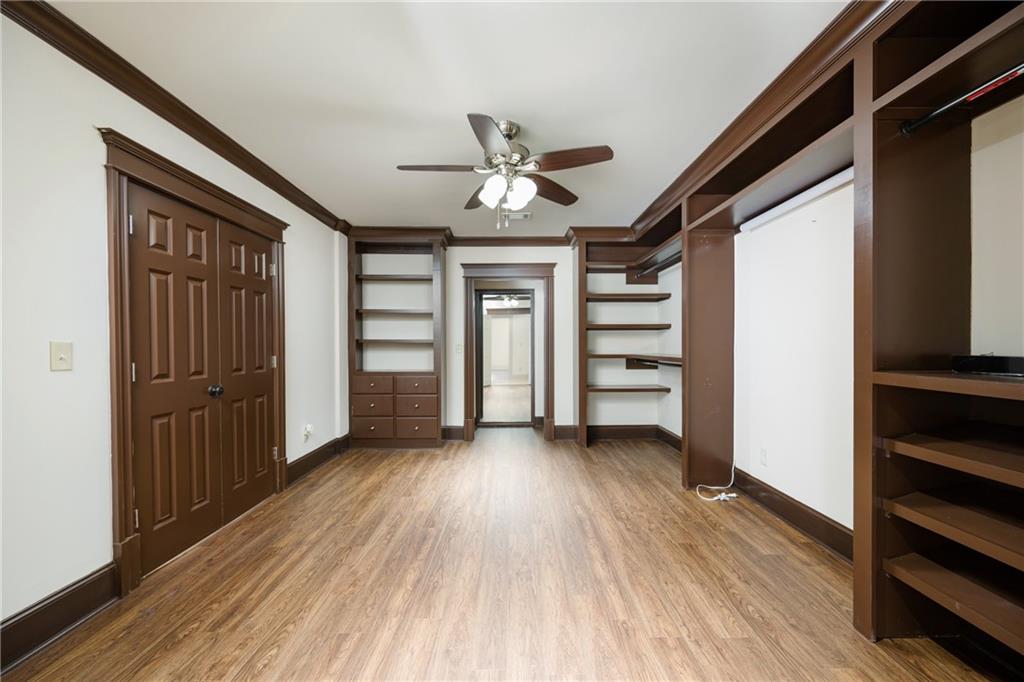 2760 Sugarloaf Club Drive Duluth, GA 30097 - Photo 57 of 67 wooden floor in an empty room with a window