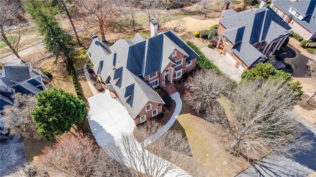 2760 Sugarloaf Club Drive Duluth, GA 30097 - Photo 65 of 67 a view of a house with a yard and sitting area