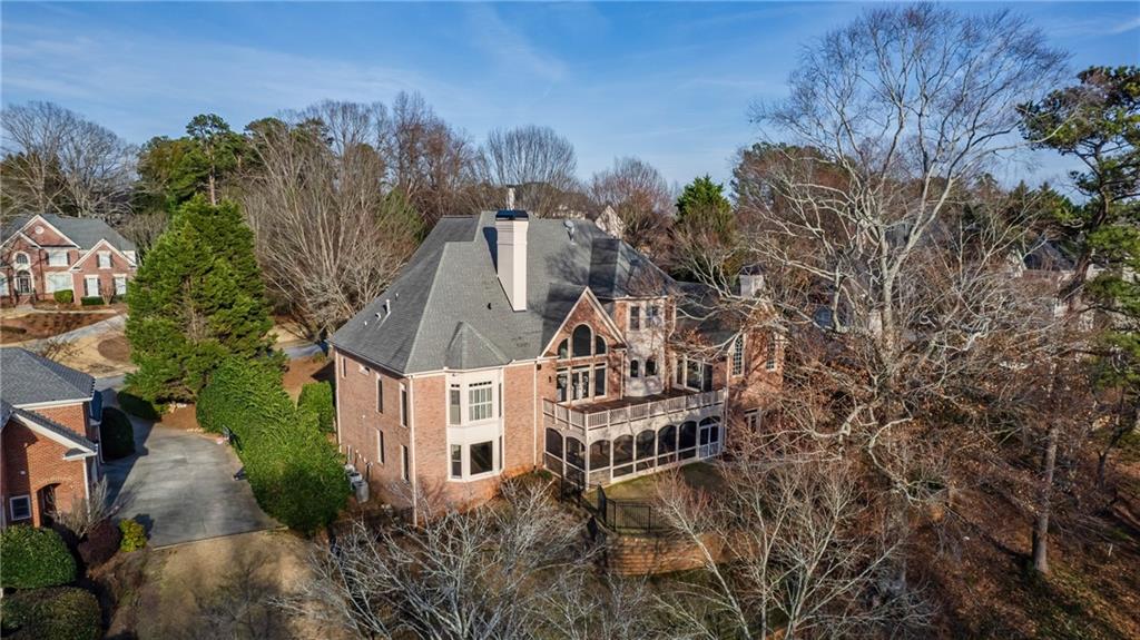 2760 Sugarloaf Club Drive Duluth, GA 30097 - Photo 67 of 67 a view of a house with a yard