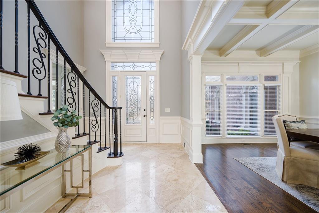2760 Sugarloaf Club Drive Duluth, GA 30097 - Photo 9 of 67 a view of an entryway with wooden floor and windows