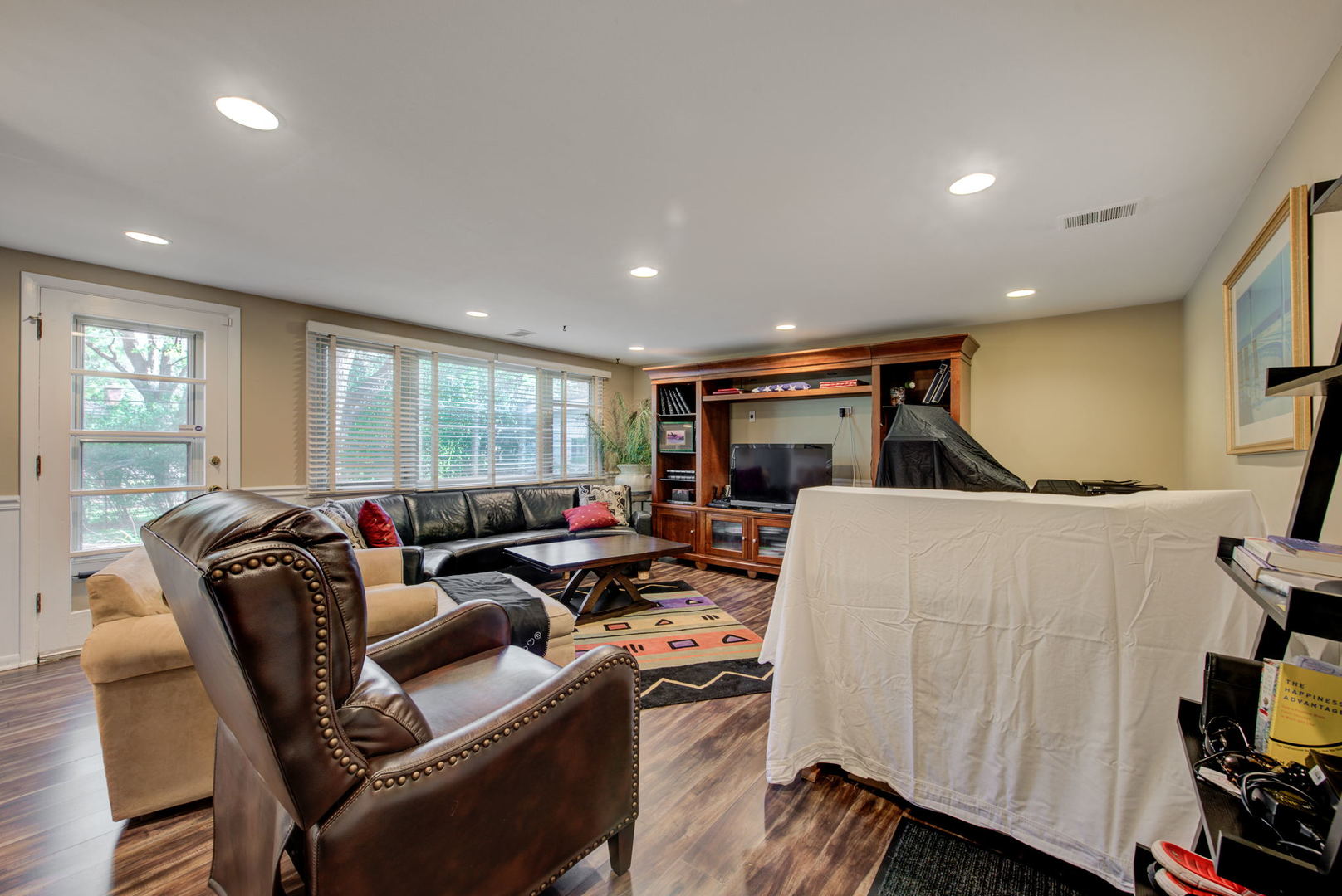 1251 Kenton Road Deerfield, IL 60015 - Photo 11 of 36 a living room with furniture a window and a wooden floor