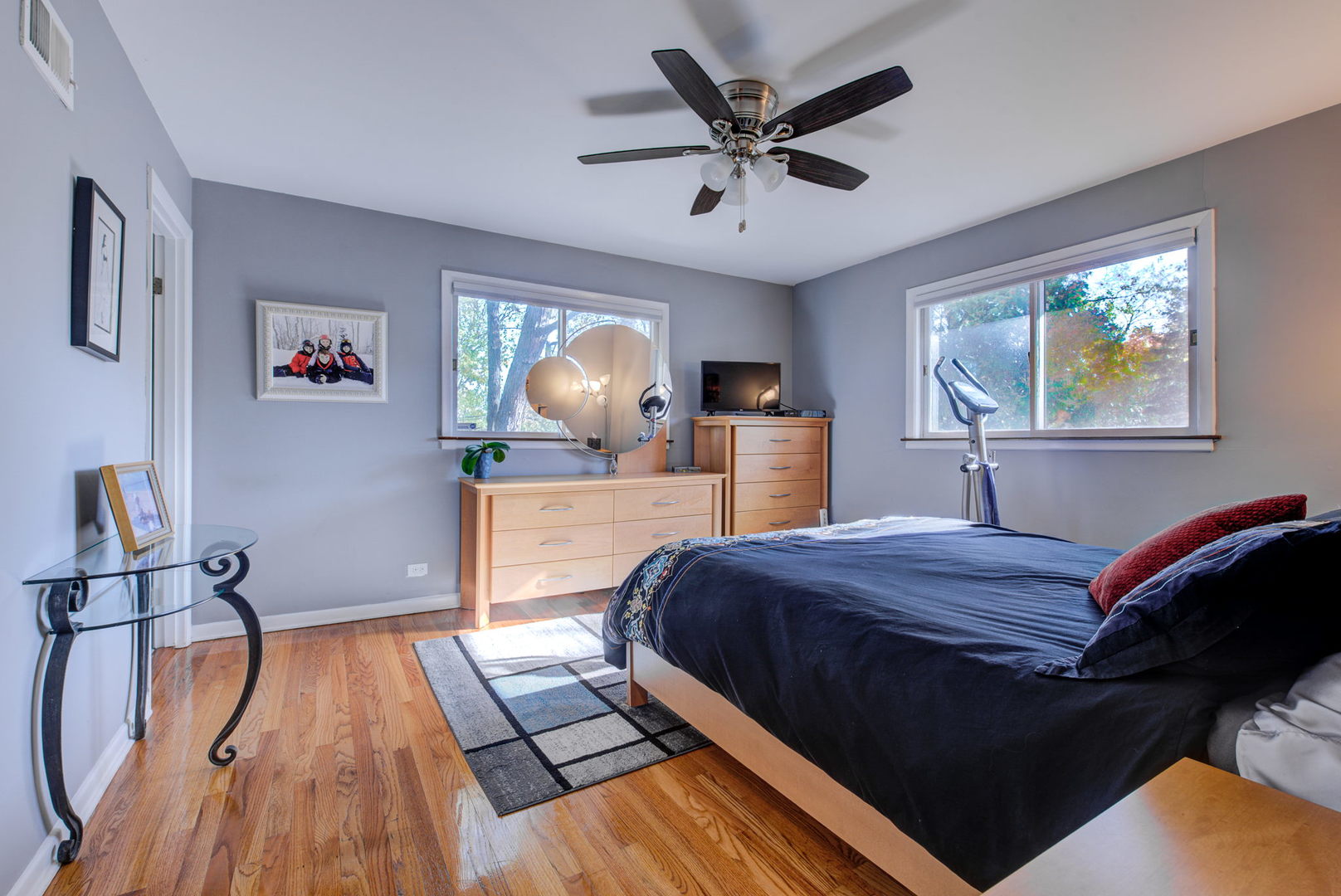 1251 Kenton Road Deerfield, IL 60015 - Photo 13 of 36 a bed room with a bed and a chandelier