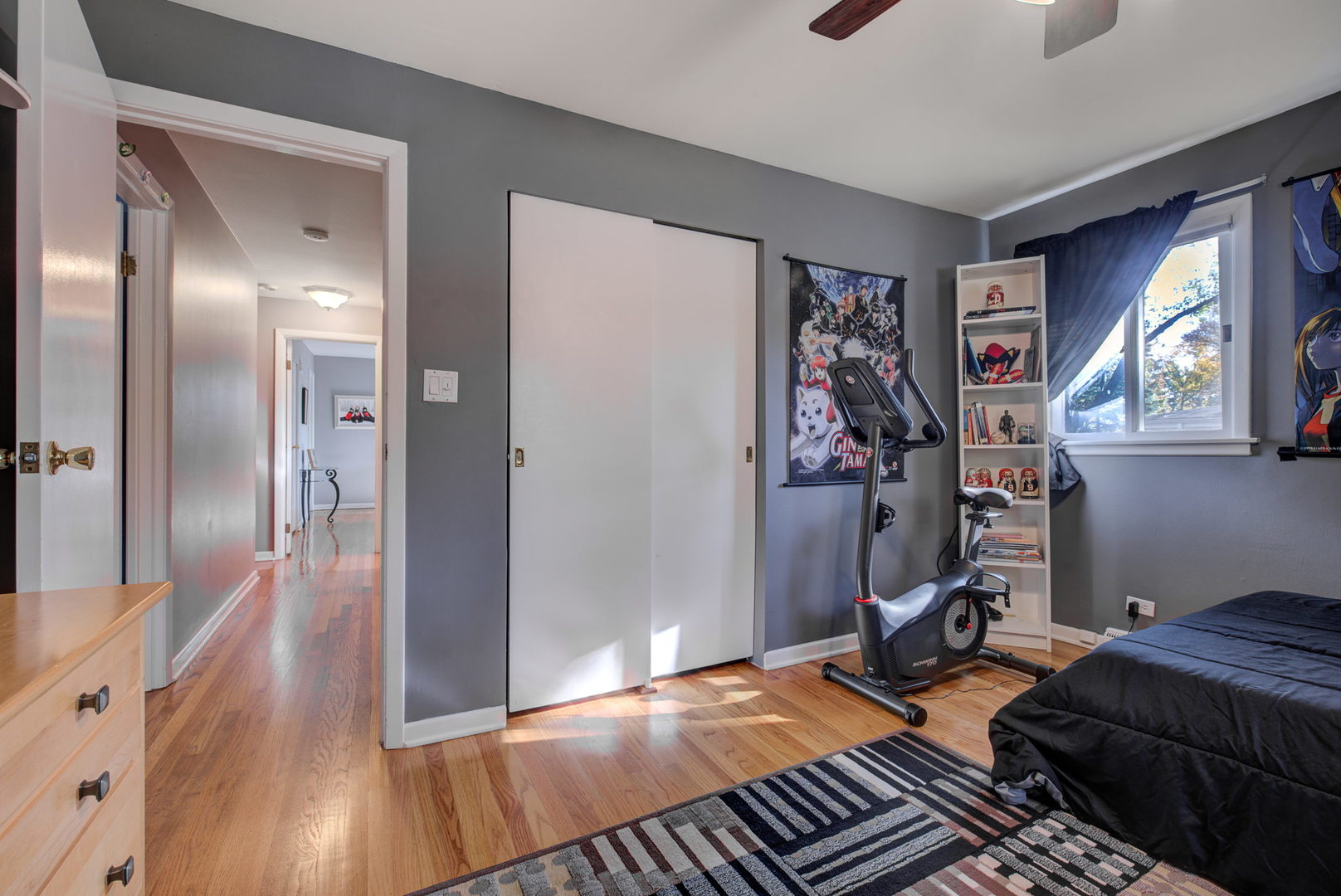 1251 Kenton Road Deerfield, IL 60015 - Photo 19 of 36 a bedroom with a bed and wooden floor