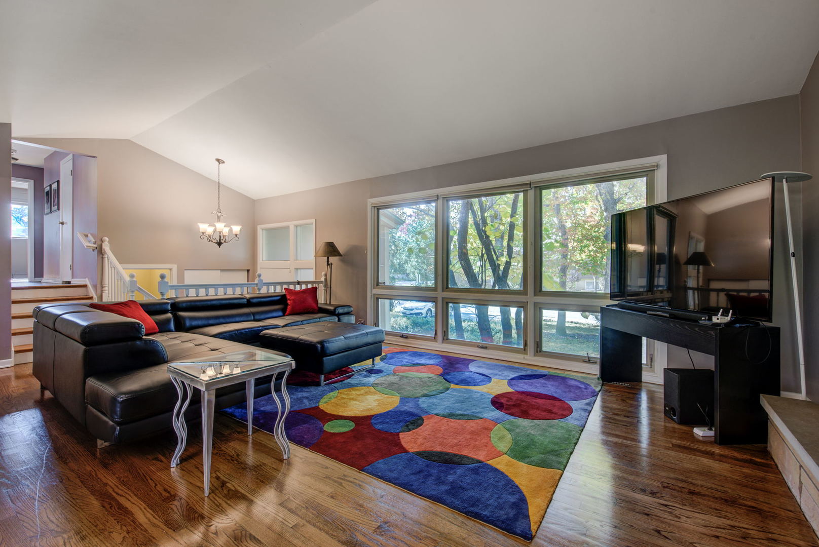 1251 Kenton Road Deerfield, IL 60015 - Photo 3 of 36 a living room filled with furniture and a floor to ceiling window