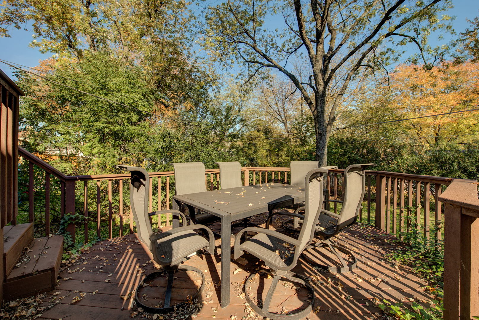 1251 Kenton Road Deerfield, IL 60015 - Photo 28 of 36 a view of a chairs and table on the deck