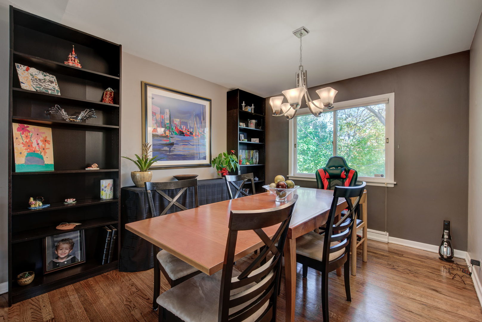 1251 Kenton Road Deerfield, IL 60015 - Photo 5 of 36 a view of a dining room with furniture window and wooden floor
