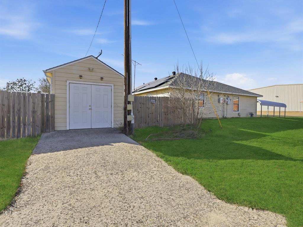 701 College Street Celeste, TX 75423 - Photo 24 of 29 a front view of a house with garden