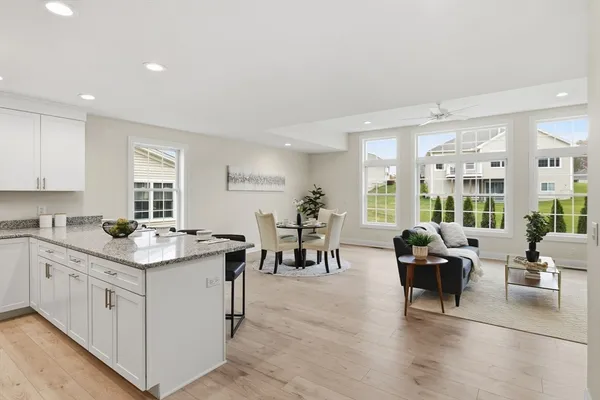 a open kitchen with stainless steel appliances granite countertop a lot of counter space and a sink