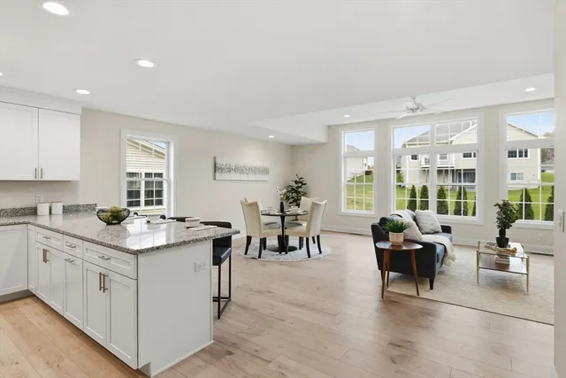 a open kitchen with stainless steel appliances granite countertop a lot of counter space and a sink