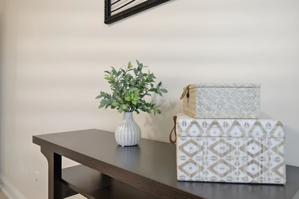 a vase of flowers sitting on a table