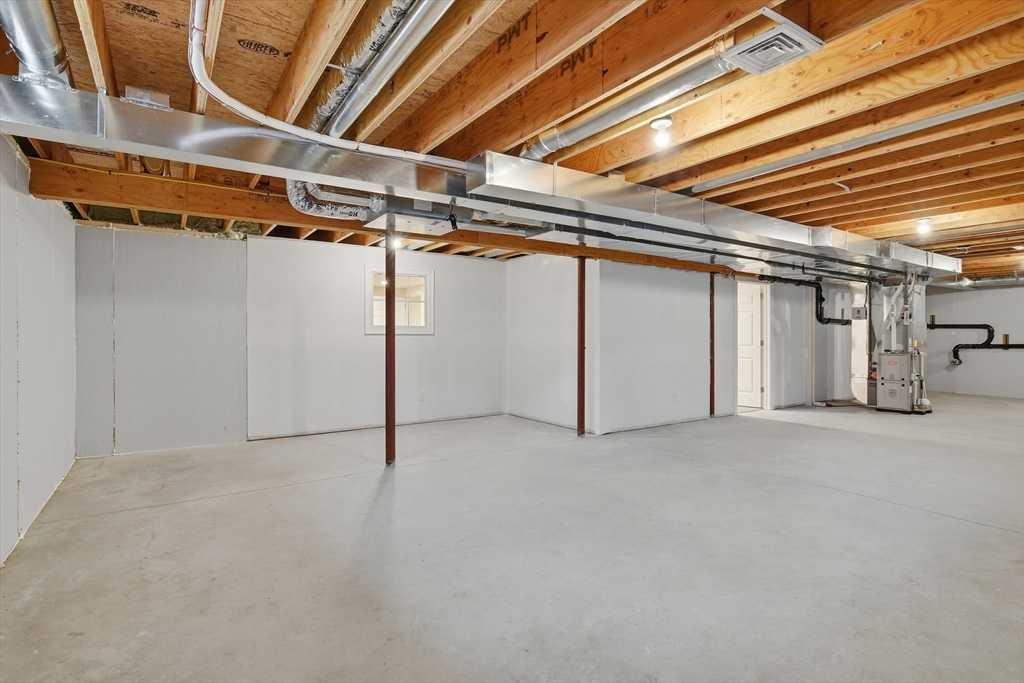 32 Lodge Lane, Unit 32 Wilbraham, MA 01095 - Photo 33 of 42 a view of an empty room