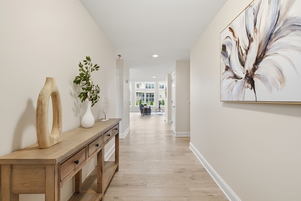 32 Lodge Lane, Unit 32 Wilbraham, MA 01095 - Photo 4 of 42 a hallway with a large window