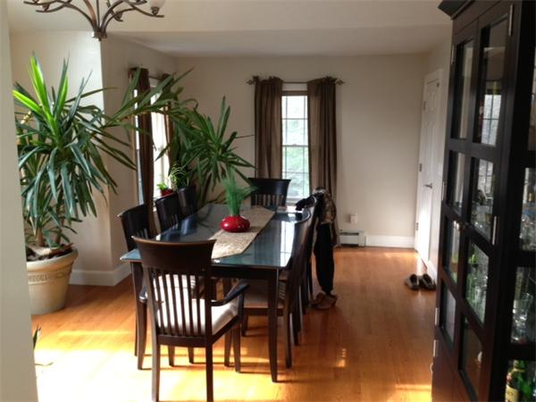 222 Perry Hill Road Acushnet, MA 02743 - Photo 6 of 13 a view of a dining room with furniture and a potted plant