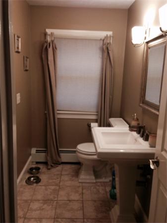 222 Perry Hill Road Acushnet, MA 02743 - Photo 8 of 13 a bathroom with a sink toilet and shower