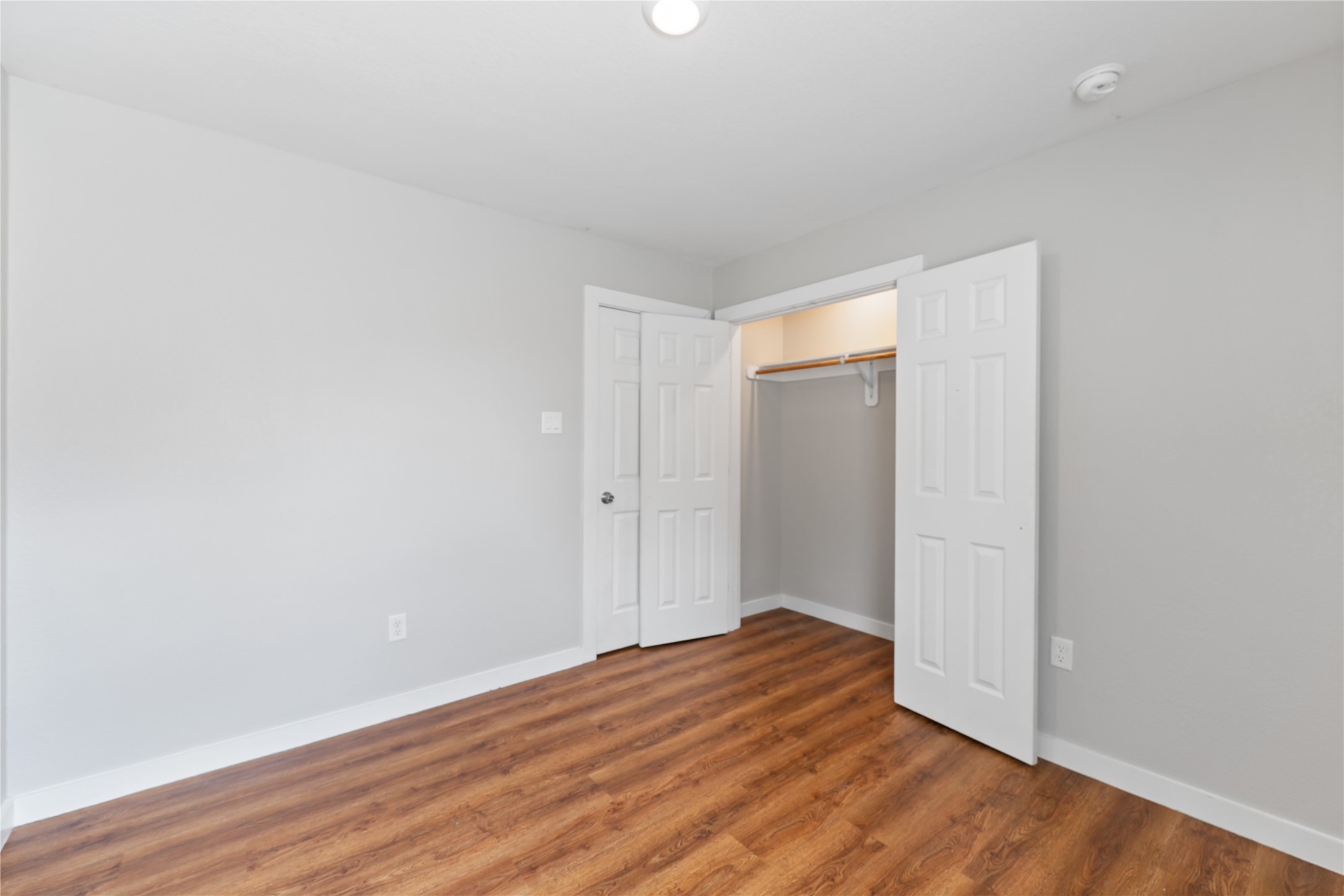 8617 Clarington Street Houston, TX 77016 - Photo 19 of 25 a view of a room with wooden floor