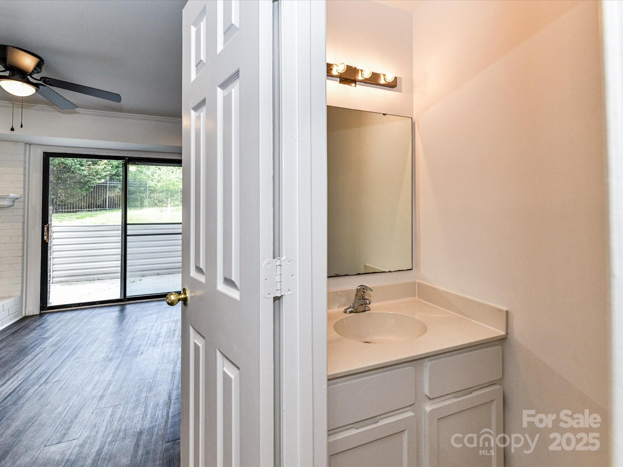 11020 Carmel Crossing Road Charlotte, NC 28226 - Photo 17 of 30 a bathroom with a sink and a mirror