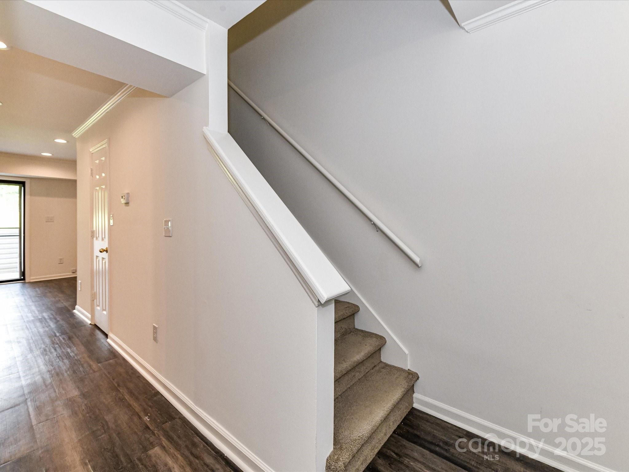 11020 Carmel Crossing Road Charlotte, NC 28226 - Photo 18 of 30 a view of entryway with wooden floor